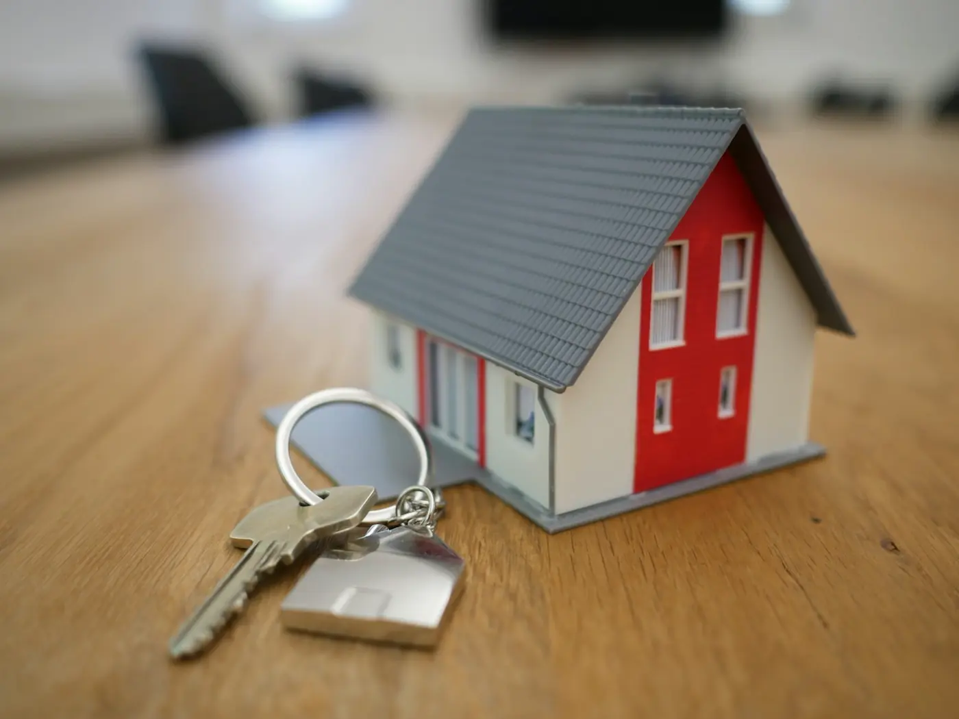 House keys resting on a wooden surface
